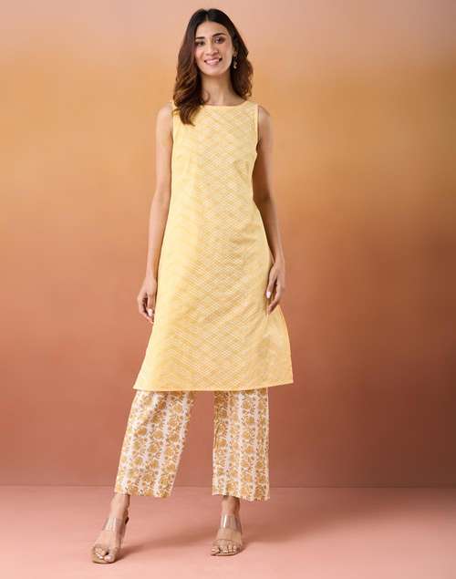 Yellow Cotton Slim Fit Printed Knee Length Kurta Yellow Cotton Slim Fit Printed Knee Length Kurta