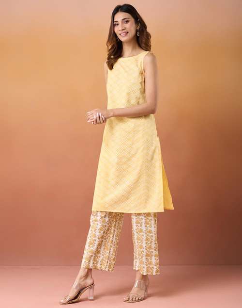 Yellow Cotton Slim Fit Printed Knee Length Kurta Yellow Cotton Slim Fit Printed Knee Length Kurta